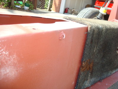 weird welded bung on chassis 2.JPG and 